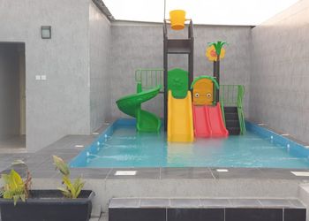 استراحة بمسطح اخضر والعاب مائيه 