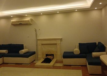 استراحة بجلسة خارجية ومسطح اخضر