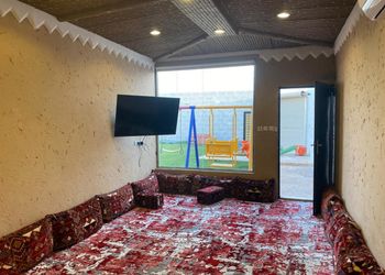 شاليه بجلسة خارجية وألعاب مائية