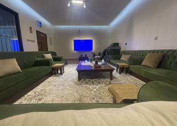شاليه بألعاب أطفال وجلسة خارجية
