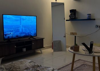 استديو بسرير وجلسة جانبية