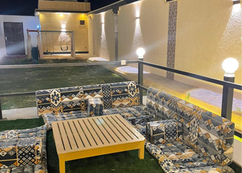 شاليه بجلسة خارجية وألعاب أطفال 