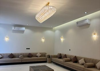 استراحة بمسطح اخضر وجلسة خارجية