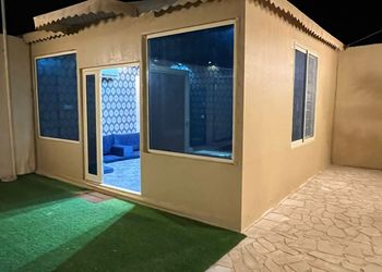 شالية بجلسة خارجية والعاب اطفال