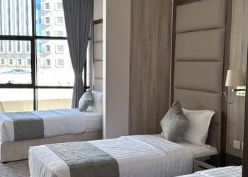 غرفة بثلاث اسره فردية