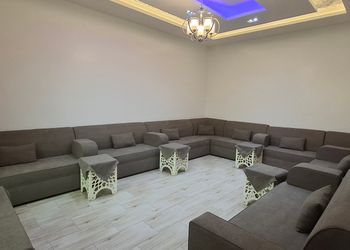 شاليه بألعاب أطفال وجلسة خارجية