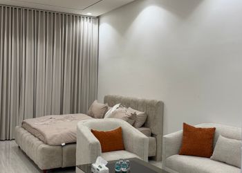 استديو بسرير ماستر وجلسة جانبية 