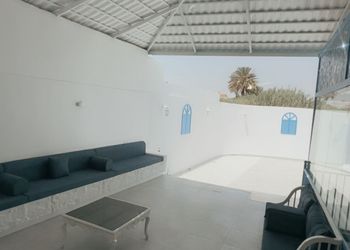شاليه بمسطح اخضر و مسبح