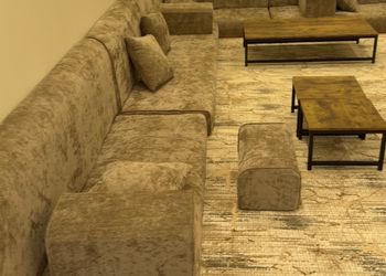 شاليه بمسطح اخضر وجلسة خارجية 