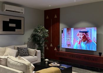 شقة أنيقة بصالة مريحة وبلياردو 