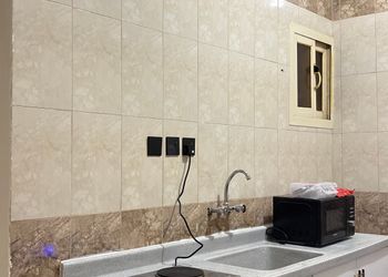استديو بسرير ماستر وجلسة جانبية 