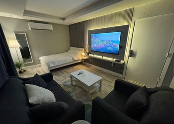 استديو بسرير ماستر وجلسة جانبية 