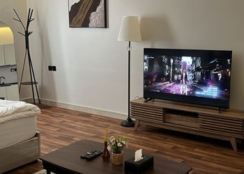 استديو بسرير ماستر وجلسة جانبية