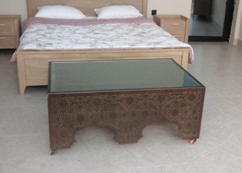 شاليه بمسطح اخضر وجلسة خارجية 
