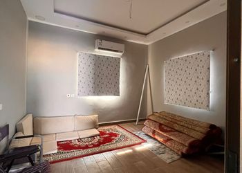 استراحة بمسطح اخضر ومجالس