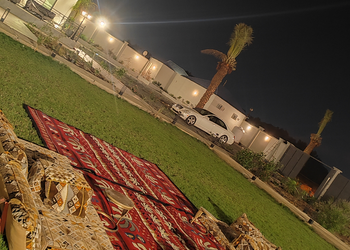استراحة بمسطح اخضر وجلسه خارجيه