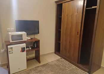 غرفة تتكون من اربعه اسره