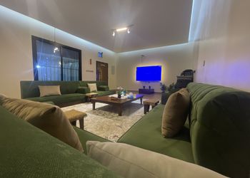 شاليه بألعاب أطفال وجلسة خارجية