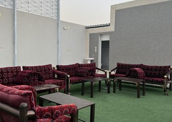 استراحة بمسطح اخضر و جلسة خارجية