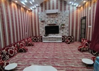 شاليه بمسطح اخضر وجلسة خارجية 