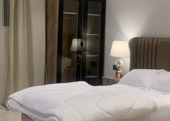 استديو أنيق بسرير ماستر وجلسة جانبية 