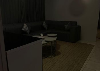 استديو بأثاث بسيط وسرير مريح 