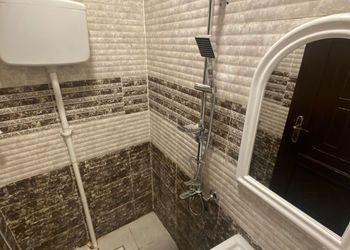 استديو بسرير فردي وجلسة