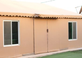 استراحة بمجالس ومسطحات خضراء