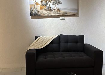 استديو بسرير ماستر وجلسة جانبية