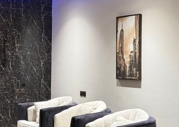 شاليه بمسطح اخضر وجلسة خارجية