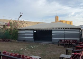 استراحة بمسطح اخضر و جلسة خارجية