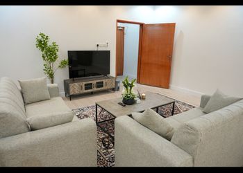 استديو بسرير ماستر وجلسة مريحة
