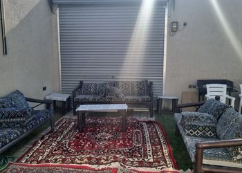 شاليه بمسطح اخضر و جلسة خارجية
