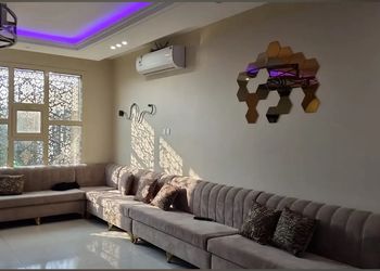 شاليه بمسطح اخضر وجلسة خارجية 
