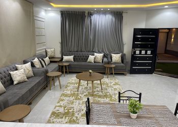 شاليه بمسطح اخضر وجلسة خارجية 