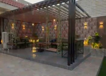 شاليه بألعاب أطفال وجلسة خارجية