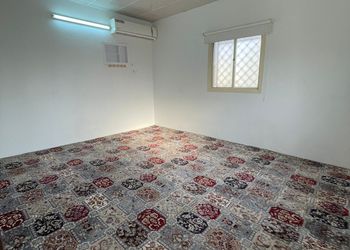 استراحة بمسطح اخضر و جلسة خارجية