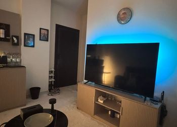 استديو بسرير ماستر وجلسة مريحة 