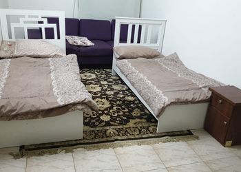 شقة بغرفتين نوم وصالة ومجلس