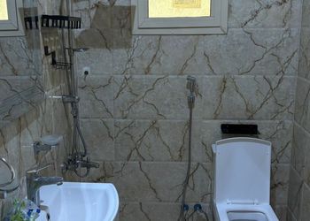 شقة بغرفة معيشة وغرفة نوم
