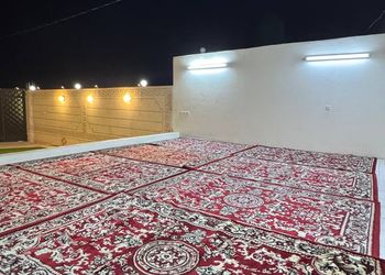 استراحة بمسبح خارجي وجلسة خارجية