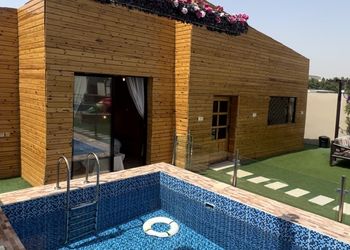 كوخ ريفي بمسبح والعاب مائية
