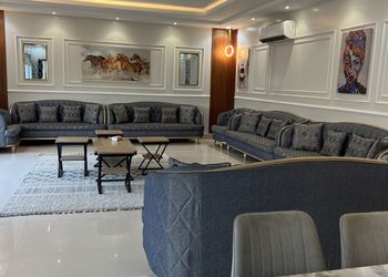 شاليه بمسطح اخضر وجلسة خارجية 