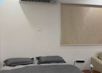 استديو بسرير ماستر وجلسة جانبية 