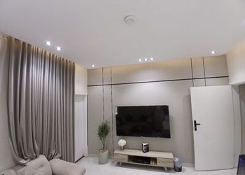 استديو بسرير ماستر وجلسة مريحة 