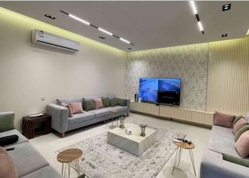 استراحة بجلسة خارجية وألعاب اطفال