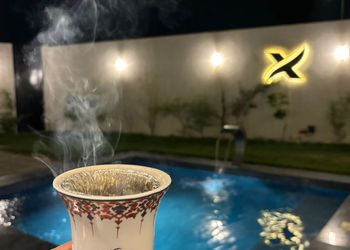 شاليه بمسبح خارجي وجلسة خارجية