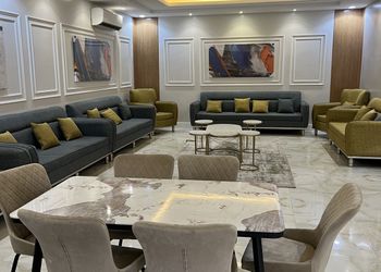 شاليه بمسطح اخضر وجلسة خارجية 