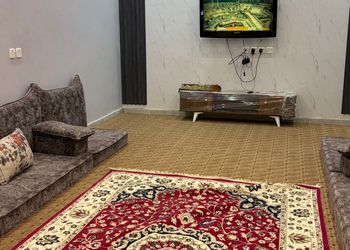 شاليه بألعاب مائية وجلسة خارجية