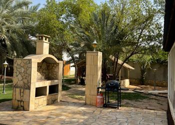 استراحة بمسبح وجلسة خارجية